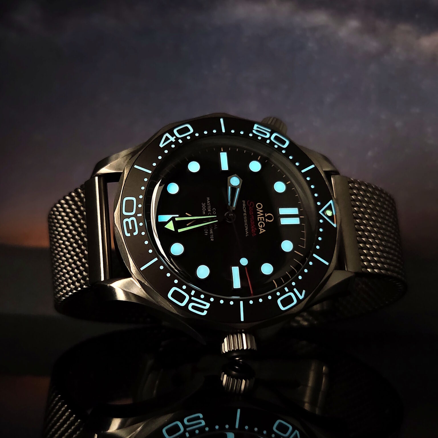 Omega Seamaster 007 lume glowing on the salt flats at night