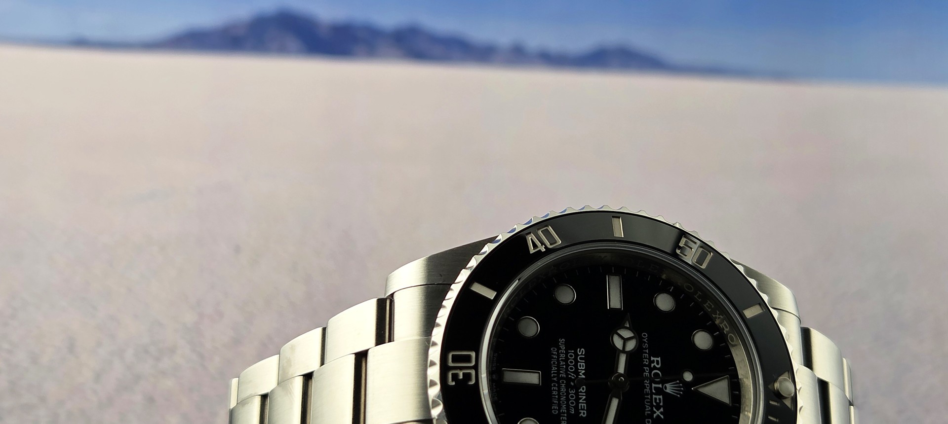 Rolex Submariner on the Bonneville Salt Flats, mountains on the horizon