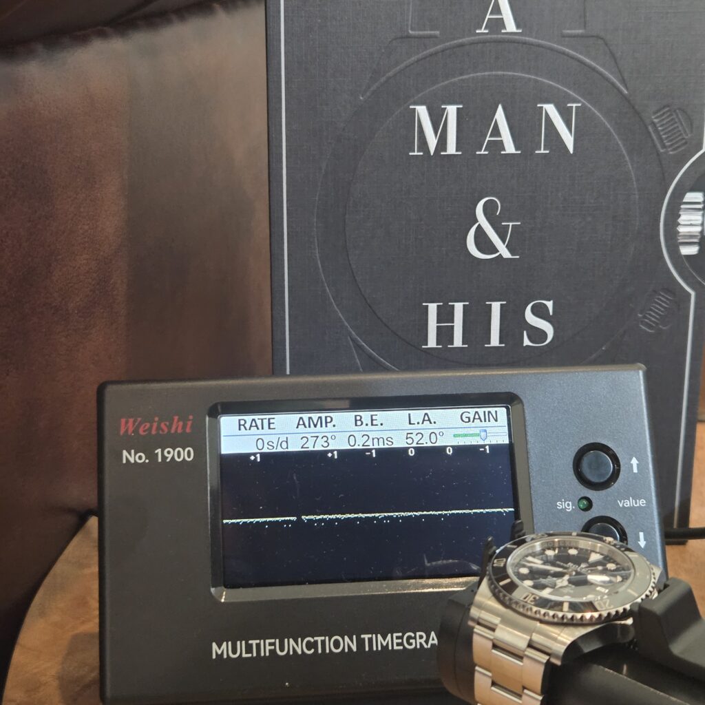 Timegrapher screen reading 0 seconds per day, 273 degrees amplitude, 0.2ms beat error, at a 52 degree lift angle